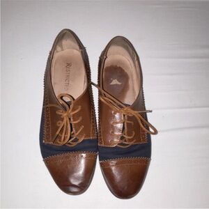 Restricted Tan and Navy Lace-Up Flats